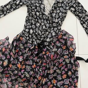 The floral dress is like new. Very gorgeous as lovely.